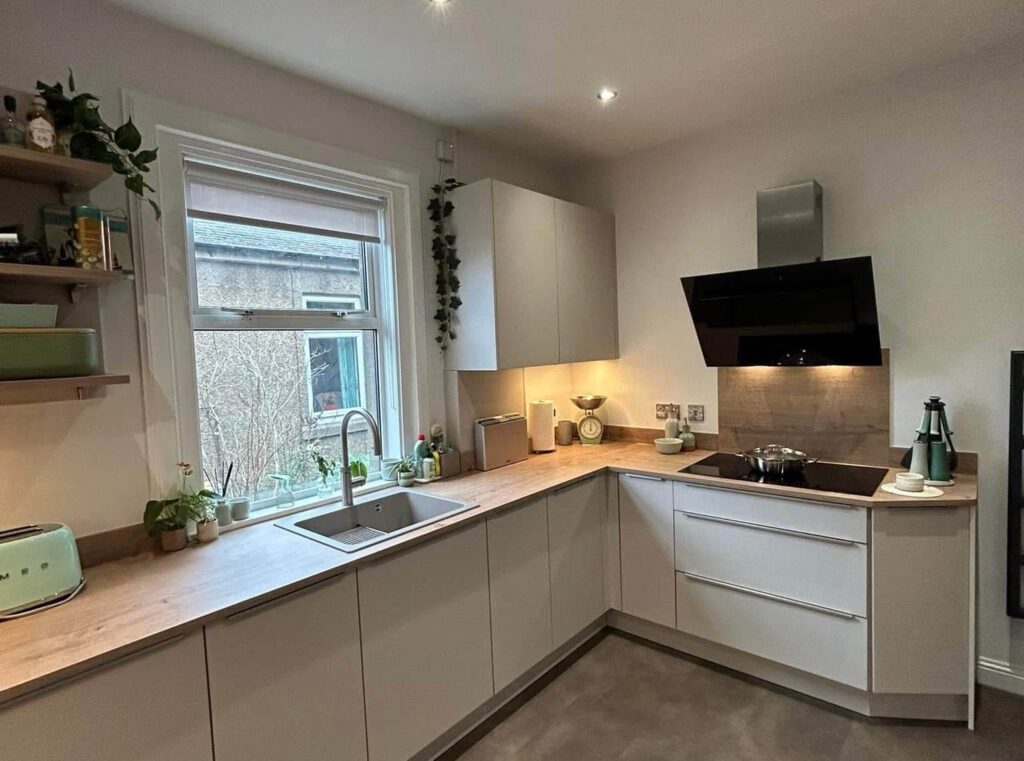 Fitted kitchen after transformation by Reid's Renovations