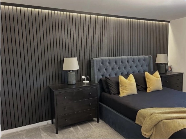 acoustic wall in bedroom in property in edinburgh. acoustic wall expertly installed in edinburgh by Reid's Renovations